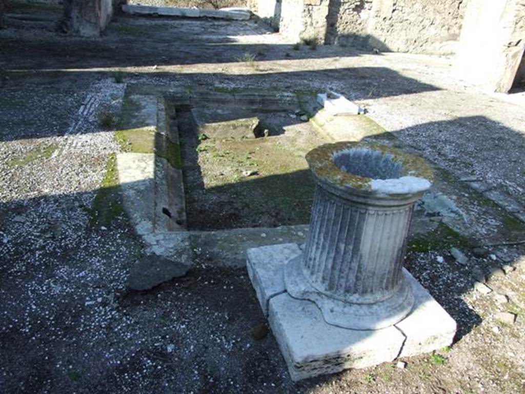 VII.15.2 Pompeii. December 2007. Impluvium and marble cistern head.