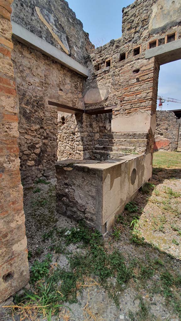 VII.15.5 Pompeii. August 2021.
Looking north-west from entrance doorway towards two-sided counter, with doorway to kitchen, at rear.
Foto Annette Haug, ERC Grant 681269 DÉCOR.