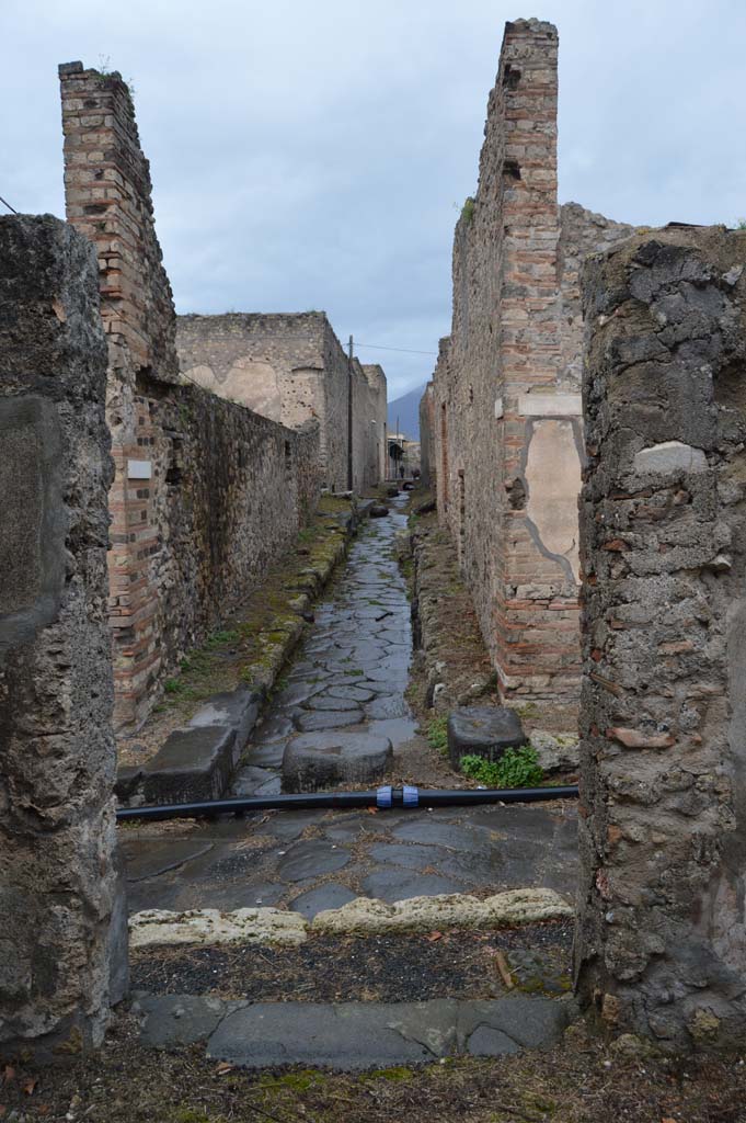 VII.15.12 Pompeii. March 2018.
Looking north from entrance doorway to Vicolo dei Soprastanti, and across to Vicolo dei Farmacista.
Foto Taylor Lauritsen, ERC Grant 681269 DÉCOR.