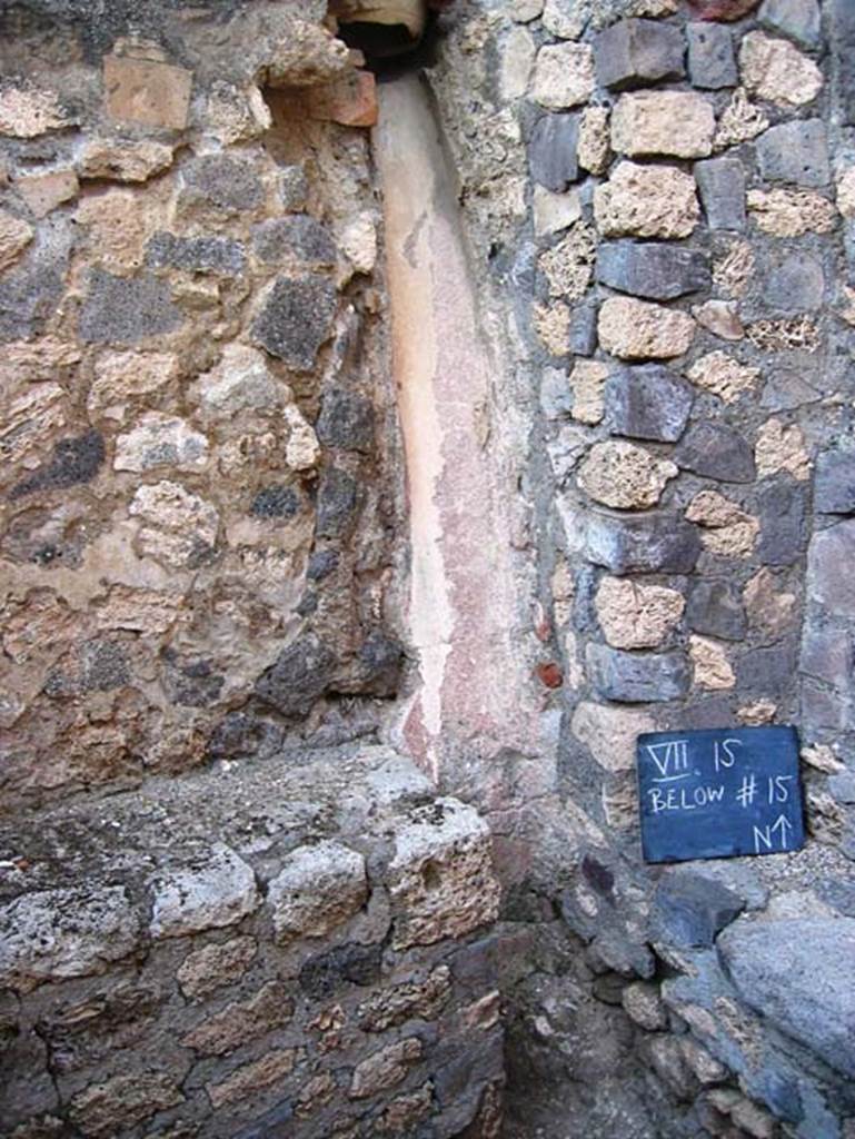 VII.15.16 Pompeii. July 2008. Room C, wide terracotta pipe in north wall to east of entrance.
Photo courtesy of Barry Hobson.