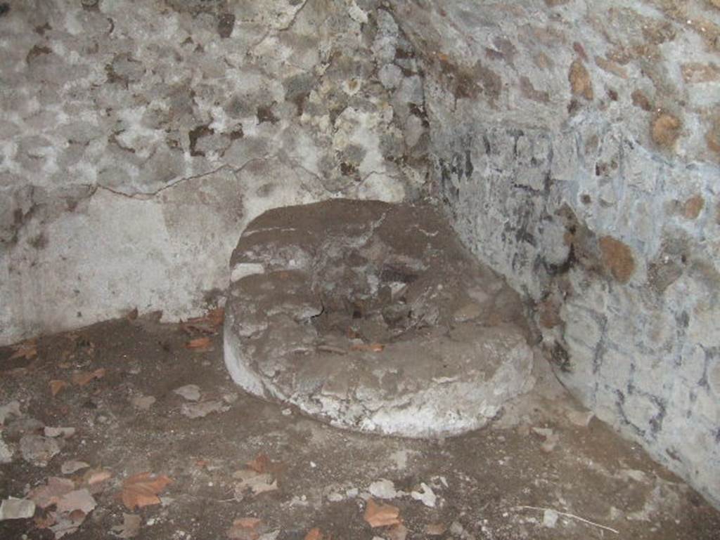 VII.15.16 Pompeii. May 2006. Open space (I), south-east corner with circular masonry base.
According to Franklin, in the centre of the masonry base was a small basin.
See Franklin, J.L. (Jnr) 1990. Pompeii, the Casa del Marinaio and its history. SAP, monograph 3. Roma; L’ERMA di Bretschnieder, (p.36).