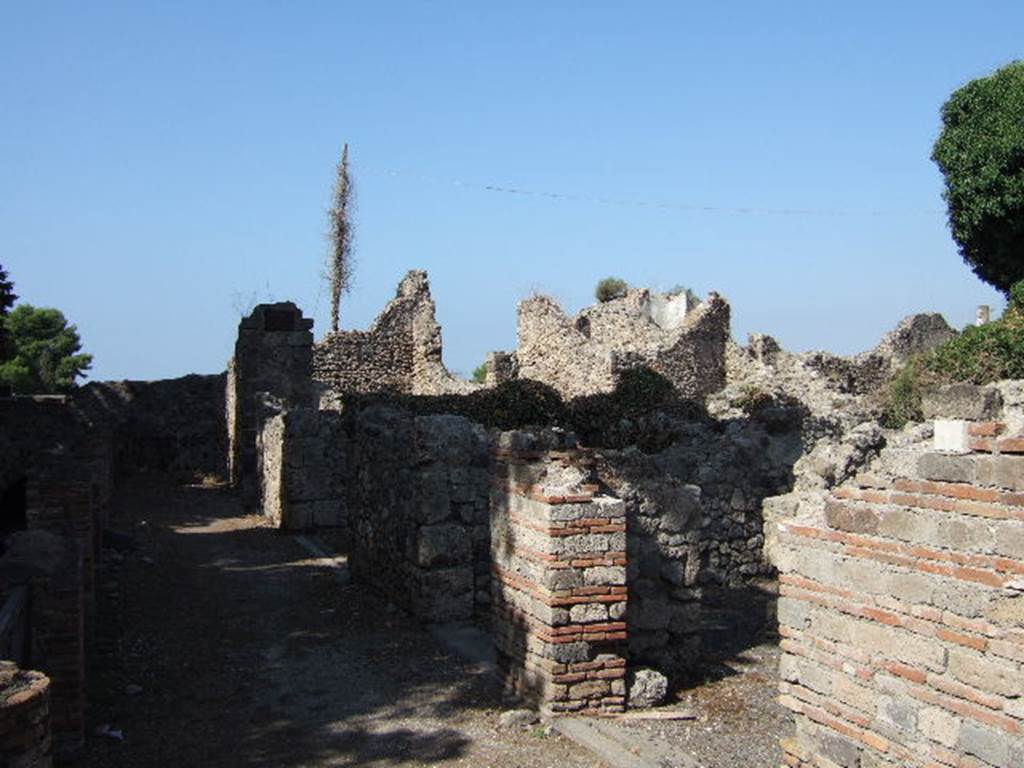 VII.16.1 Pompeii. September 2005. Looking west towards doorways of VII.16.1-4 on Via Marina.
