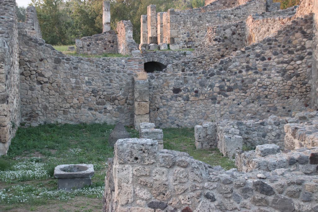 VII.16.1 Pompeii. October 2023.
Looking towards east side of atrium, with tablinum, on left, triclinium in rear right, cubiculum, on right. Photo courtesy of Klaus Heese.