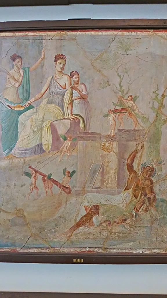 VII.16.10 Pompeii. Found on 20th Feb 1851 in oecus on west side of atrium, adjoining the tablinum.
Wall painting of the drunken Hercules with Omphale, and cupids who are stealing his club.
Cut from the wall and taken to Naples Archaeological Museum. Inventory number 9000.
Photo courtesy of Giuseppe Ciaramella, November 2018.