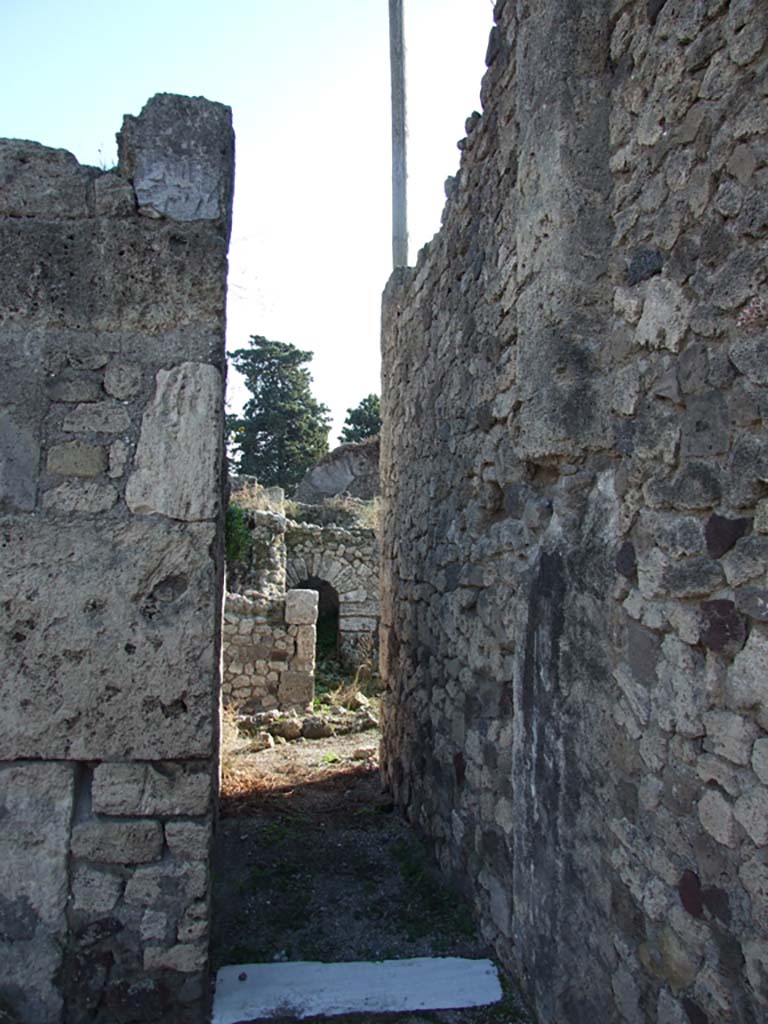 VII.16.13 Pompeii. December 2007.
Room 11, corridor on south side of atrium, leading to rooms on southern boundary, and VII.16.12.