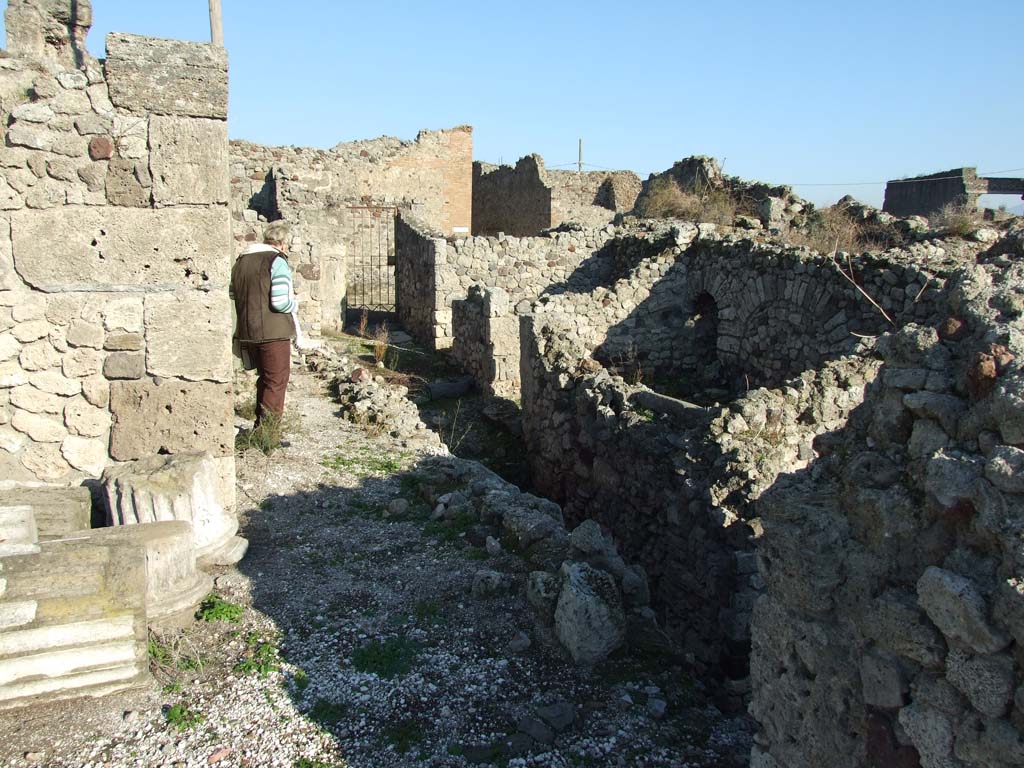 VII.16.13 Pompeii. December 2007. Looking east along corridor 12 towards doorway at entrance VII.16.12.
Corridor 12 on the ground floor level leads into corridor 40 on the lower level.