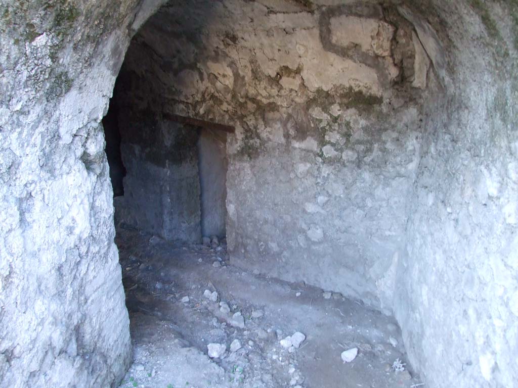 VII.16.13 Pompeii. December 2007. Looking north-west into corridor 40. This corridor runs below area 18, the peristyle