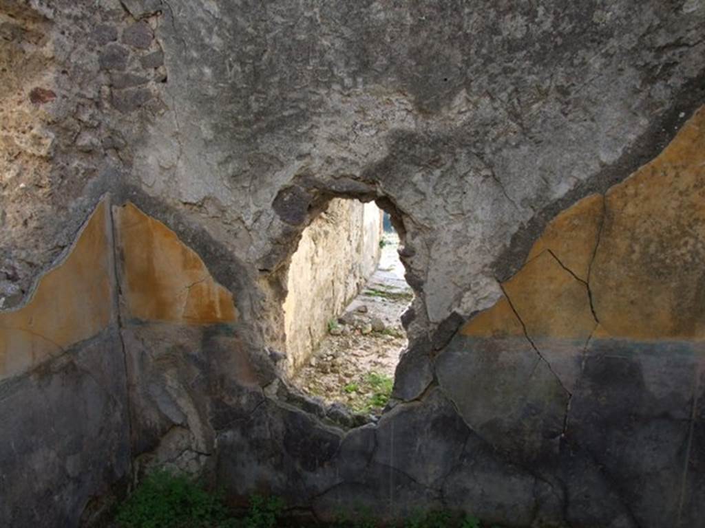 VII.16.13 Pompeii. December 2007. Room 36, looking west into room 32 through hole in wall.