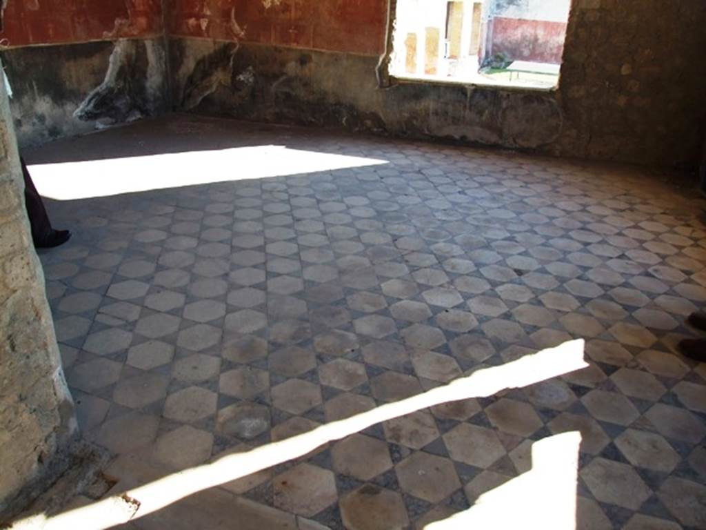 VII.16.17-22 Pompeii. December 2007. Oecus with marble tiled floor.
Looking south through window towards hanging garden area. This room also had a window in its west wall, with view of gardens and onto Bay of Naples.