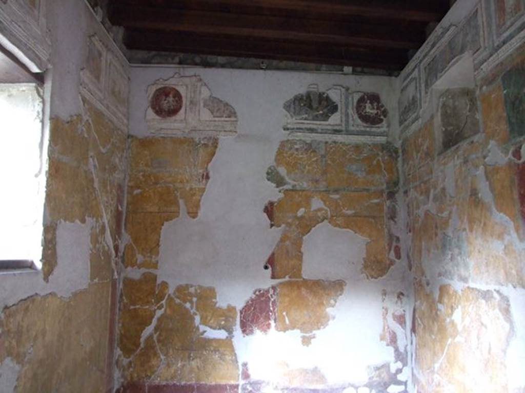 VII.16.a Pompeii. December 2006. Room 1, north wall with painting and stucco work.