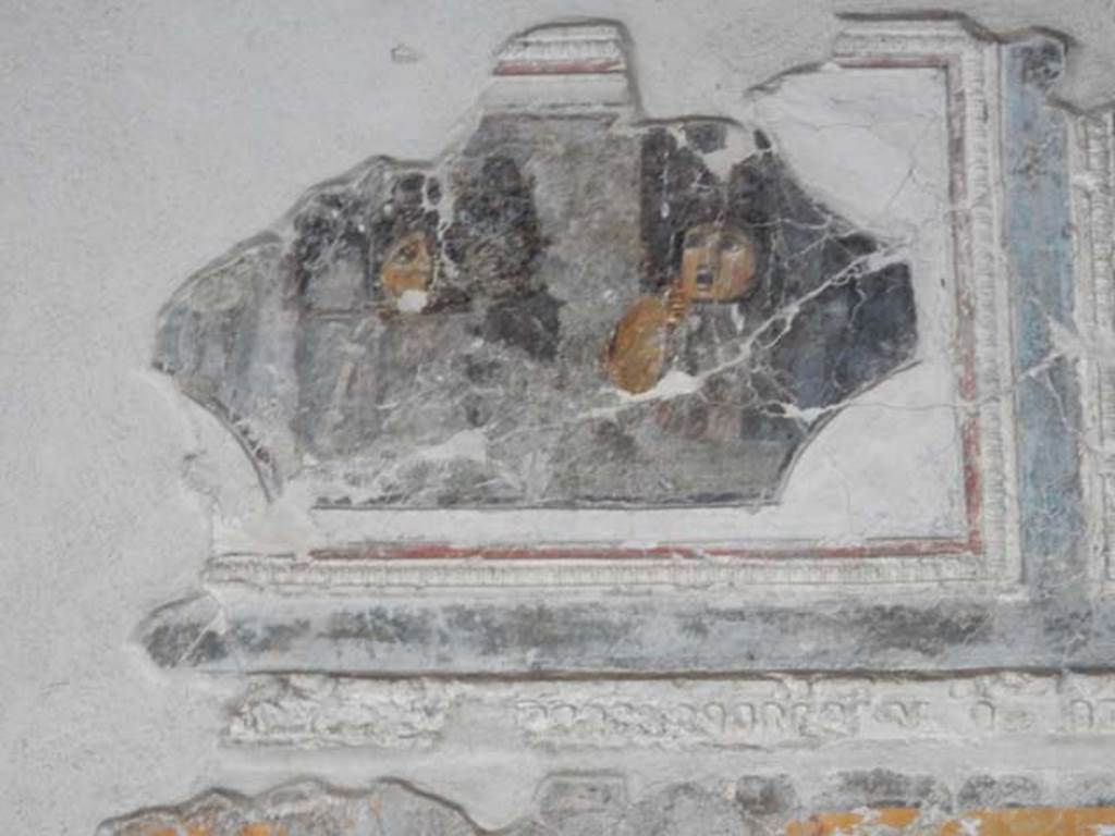 VII.16.a Pompeii. May 2015. Room 1, plasterwork and painting of masks on north wall. Photo courtesy of Buzz Ferebee.