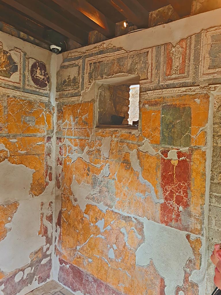 VII.16.a Pompeii. November 2023.
Room 1, north-east corner and east wall. Photo courtesy of Giuseppe Ciaramella.