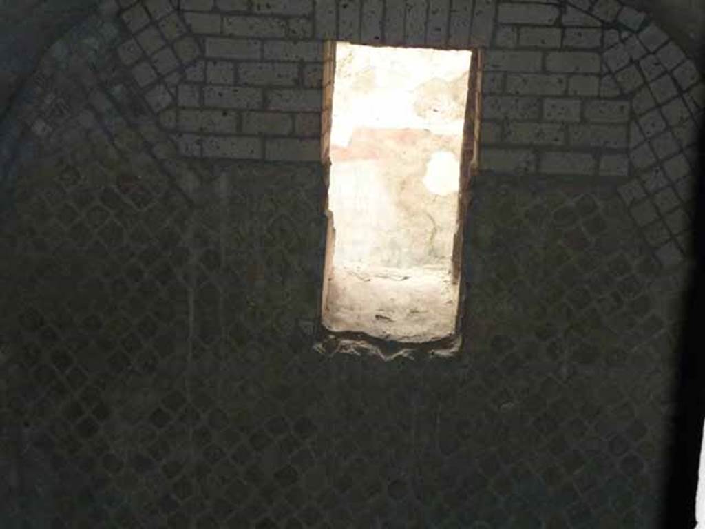 VII.16.a Pompeii. May 2010. Looking through hole in rear wall, across room 13 towards window in east wall of room 9, natatio.