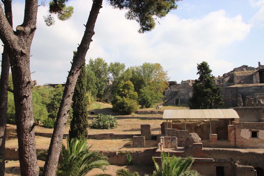 VII.16.a Pompeii. September 2019.
Looking east to area on north side of pool area, (under covering roof, on right). Photo courtesy of Klaus Heese.