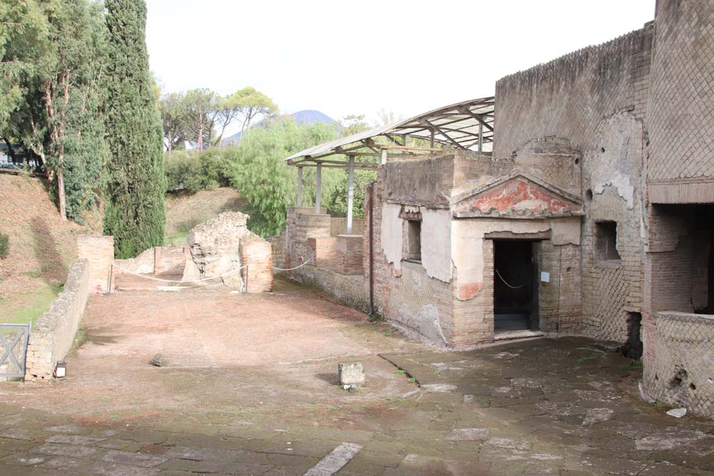 VII.16.a Pompeii. October 2020. Looking north across Courtyard C to remains of room on west side of room 2, the hot pool.
Photo courtesy of Klaus Heese.