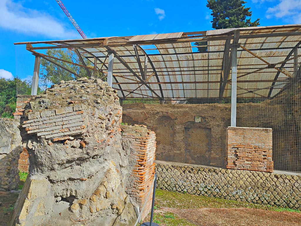 VII.16.a Pompeii. November 2023.
Looking east towards remains of large piece of debris from the eruption. Photo courtesy of Giuseppe Ciaramella.