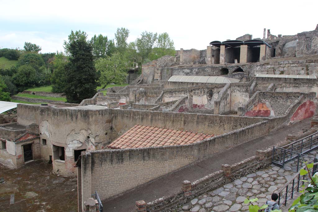 VII.16.a Pompeii. April 2014.
Looking north-east from entrance to Baths, lower left, along portico on roadway leading to Porta Marina. Photo courtesy of Klaus Heese.