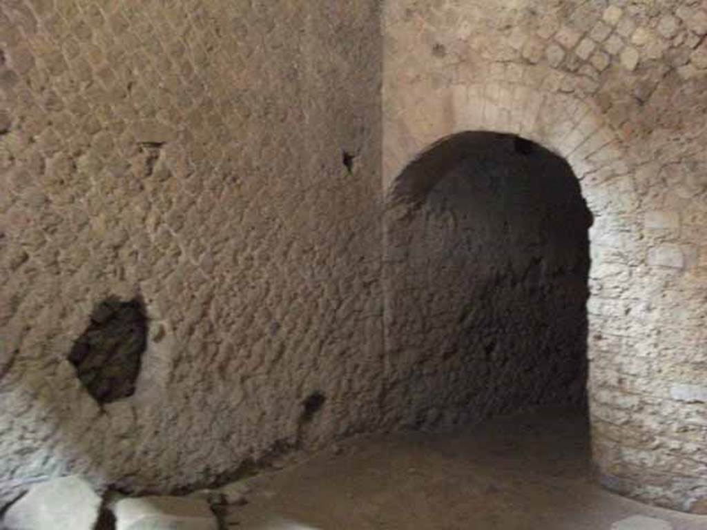 VII.16.a Pompeii. May 2010. Room 13, arch in north-west corner leading to room 11.
