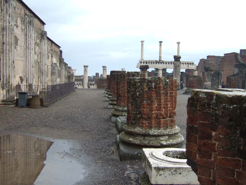 VIII.1.1 Pompeii. December 2005. Basilica, looking east along north corridor towards Forum.