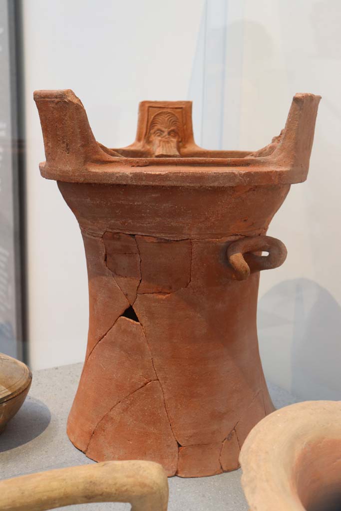 VIII.1.4 Pompeii. February 2021.
Brazier with heads of Silenus, made in Asia Minor (western coast of Turkey).
Found in a dump on the western side of the Forum.
Photo courtesy of Fabien Bièvre-Perrin (CC BY-NC-SA).