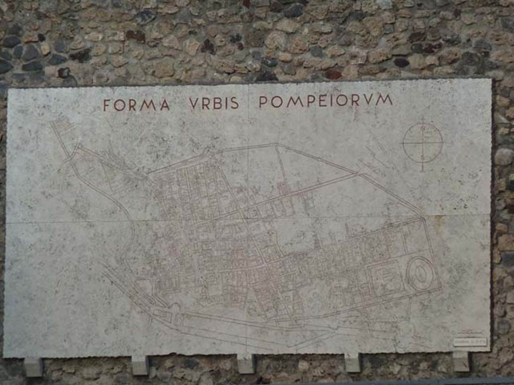 VIII.1.4 Pompeii Antiquarium. September 2015. Looking east towards the Forma Urbis Pompeiorum. This is a plan of Pompei cut onto a slab of travertine 5m wide by 2.73m high and was completed in 1947.
See Garcia y Garcia, L., 2006. Danni di guerra a Pompei. Rome: L’Erma di Bretschneider. (p. 205).