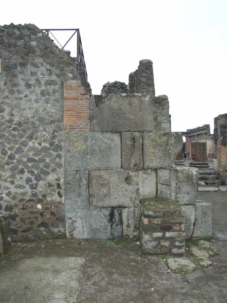 South-east corner of the Basilica near VIII.1.7, Pompeii. December 2007.
This shows the massive wall at the south end of the vestibule of the Basilica.
It conceals one of Pompeii’s deep wells.