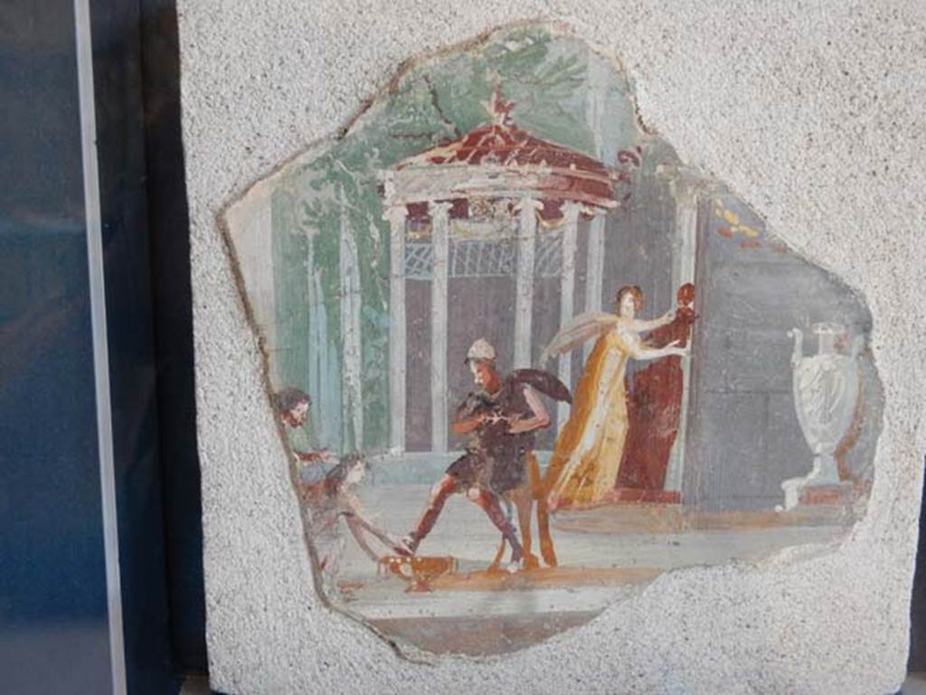 VIII.2.1 Pompeii. May 2018. Fragment of fresco showing the return of Odysseus to Ithaca.
Found 31st December 1973, outside of the wall of the third room under the House of Championnet.
Pompeii Inventory number 14231. Photo courtesy of Buzz Ferebee.