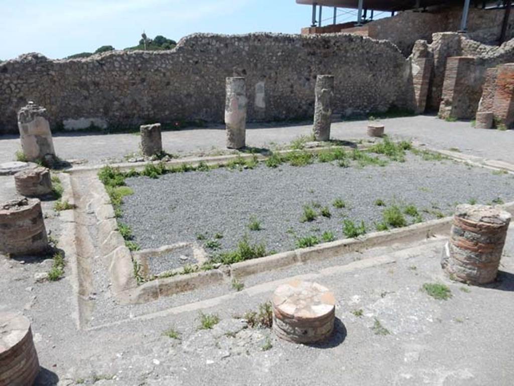 VIII.2.3 Pompeii. May 2018.
Looking towards north-west corner of peristyle garden with doorway to small room, on right. Photo courtesy of Buzz Ferebee.