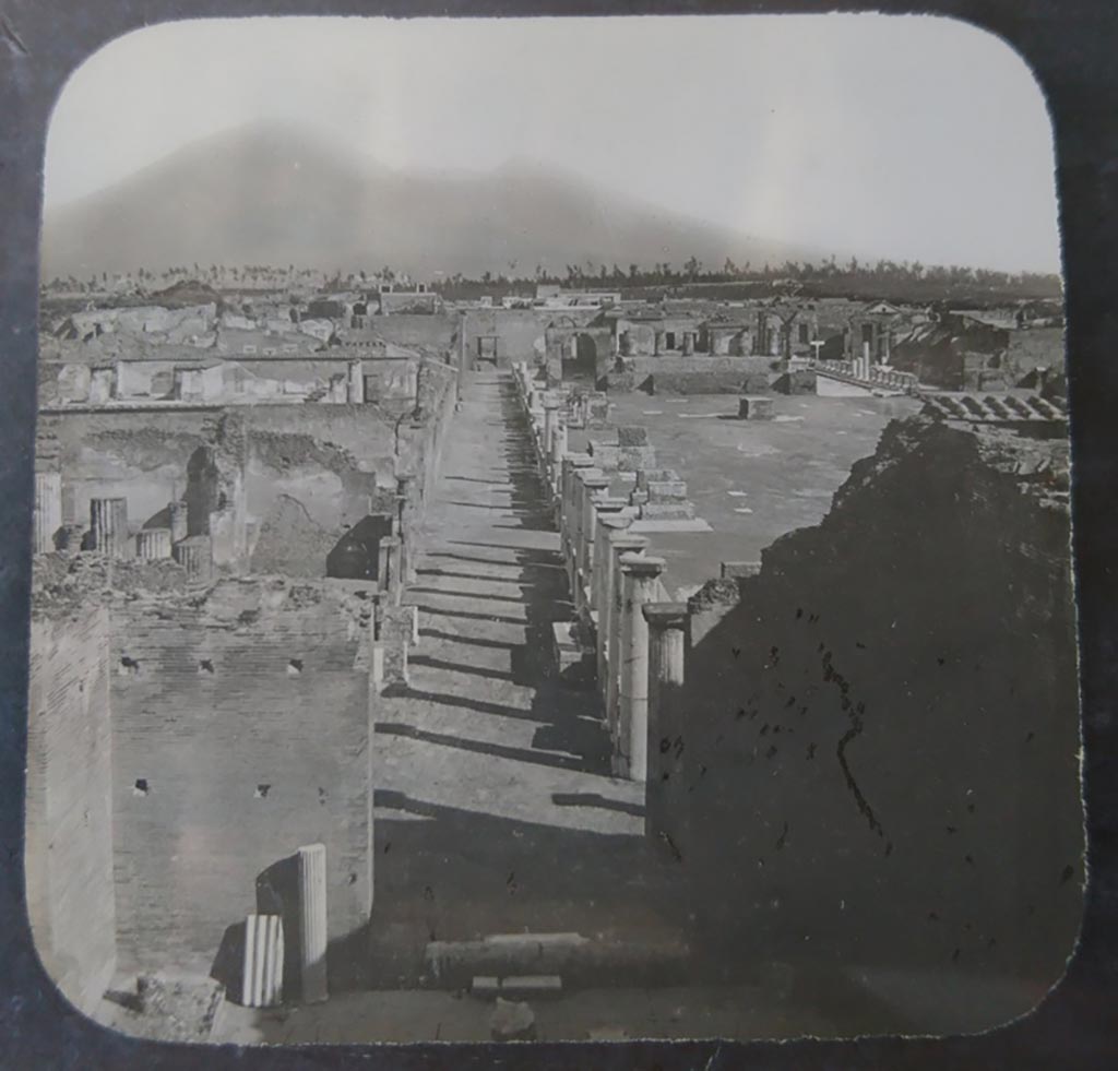 VIII.2.6 Pompeii. c.1900. C. and G. Lantern slide published by A. Laverne.
Looking north from inside VIII.2.6, lower, along west side of Forum.