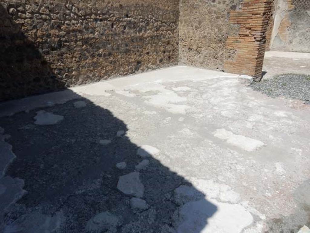 VIII.2.3 Pompeii. May 2018. Flooring in north-east corner of room in centre of north side of atrium. The doorway on the right leads into another room in the north-east corner. Photo courtesy of Buzz Ferebee.