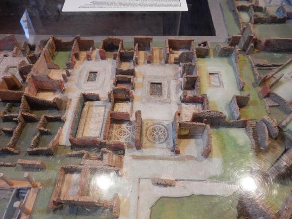 VIII.2.14/VIII.2.16 Pompeii, centre left and centre right. May 2018. Detail from cork model. Photo courtesy of Buzz Ferebee.
On the right are VIII.2.17/18/19/20, part of the ground floor level of the Sarno Baths.