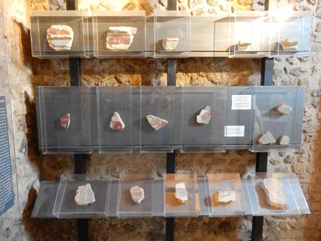 VIII.2.13/14/16 Pompeii. May 2018. Plaster fragments on display.
Photo courtesy of Buzz Ferebee.