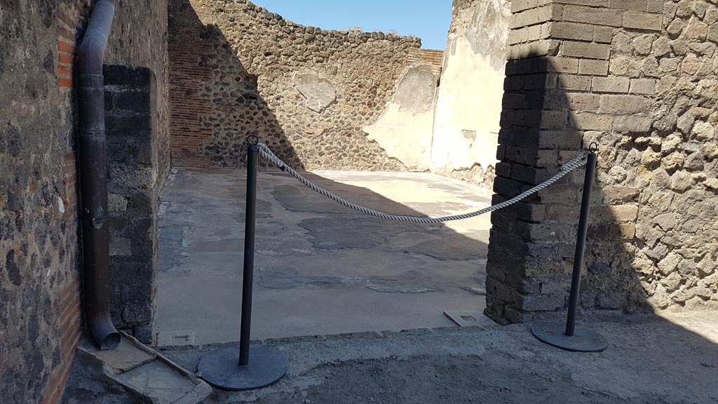 VIII.2.14 Pompeii. August 2023.
Looking west through doorway to room in south-west corner of atrium. Photo courtesy of Maribel Velasco.