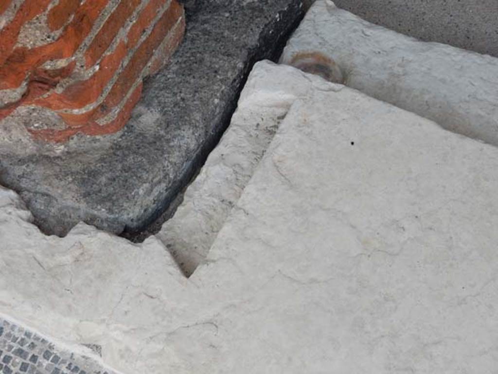 VIII.2.16 Pompeii. May 2017. Detail of east side of doorway threshold to central cubiculum. Photo courtesy of Buzz Ferebee.
