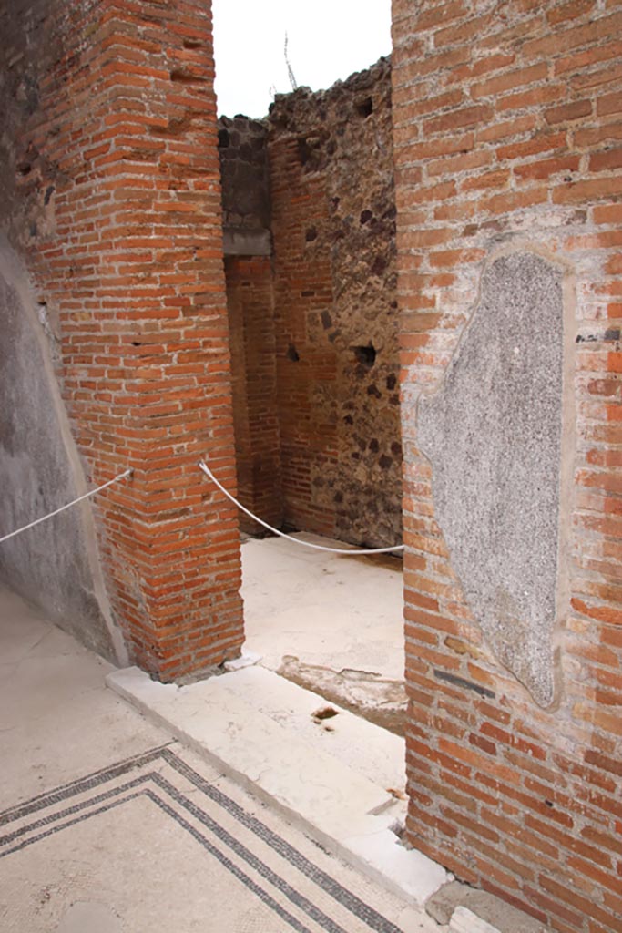 VIII.2.16 Pompeii. May 2024.
Looking through doorway in west wall in south-west corner of atrium. Photo courtesy of Klaus Heese.