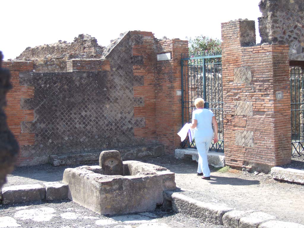 VIII.2.20 Pompeii. September 2005. Entrance to Sarno Baths with fountain outside.