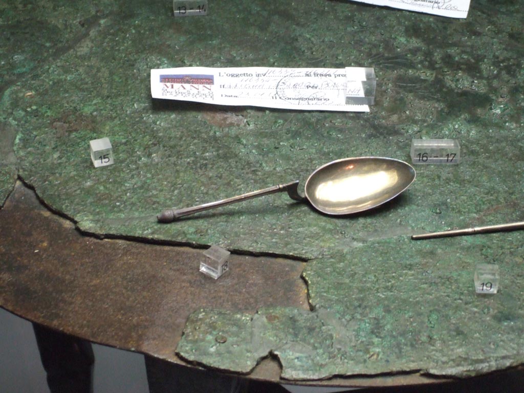 Silver spoon of type ligula found 20th September 1887 in VIII.2.23.
Now in Naples Archaeological Museum. Inventory number 25416.