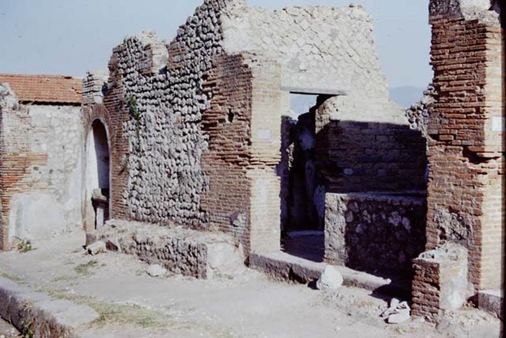 VIII.2.24 Pompeii. 1968. Looking east to entrance doorway, and bench outside near street shrine, on left. Photo by Stanley A. Jashemski.
Source: The Wilhelmina and Stanley A. Jashemski archive in the University of Maryland Library, Special Collections (See collection page) and made available under the Creative Commons Attribution-Non Commercial License v.4. See Licence and use details.
J68f2334