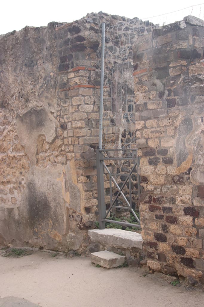 VIII.2.27 Pompeii. October 2023.
Entrance doorway to kitchen services and lower floor. Photo courtesy of Klaus Heese.