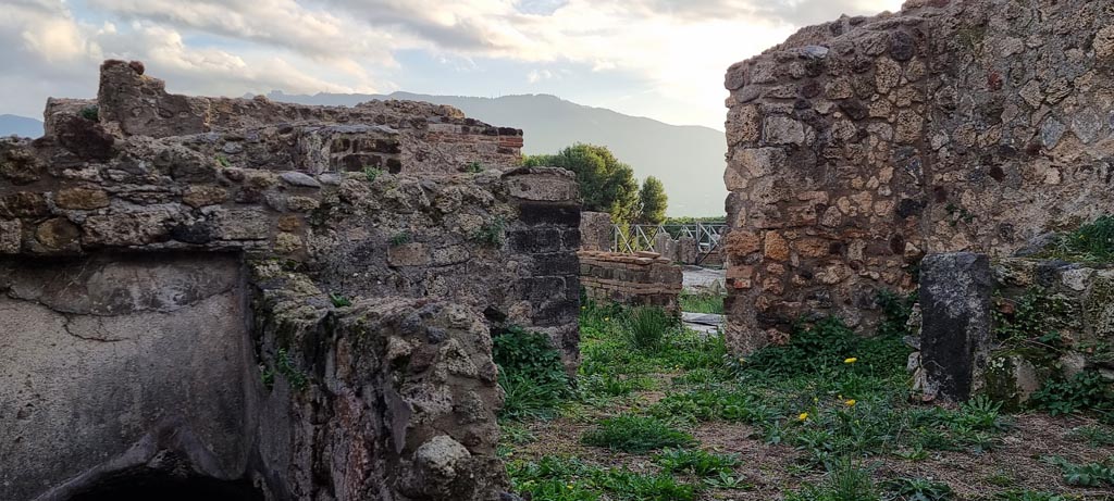 VIII.2.27 Pompeii. December 2023.
Looking south across kitchen area towards doorway leading towards atrium. Photo courtesy of Miriam Colomer.