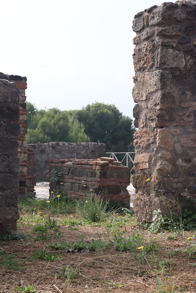 VIII.2.27 Pompeii. October 2023.
Looking through doorway from south side of kitchen into room on east side of atrium of VIII.2.26.
Photo courtesy of Klaus Heese.