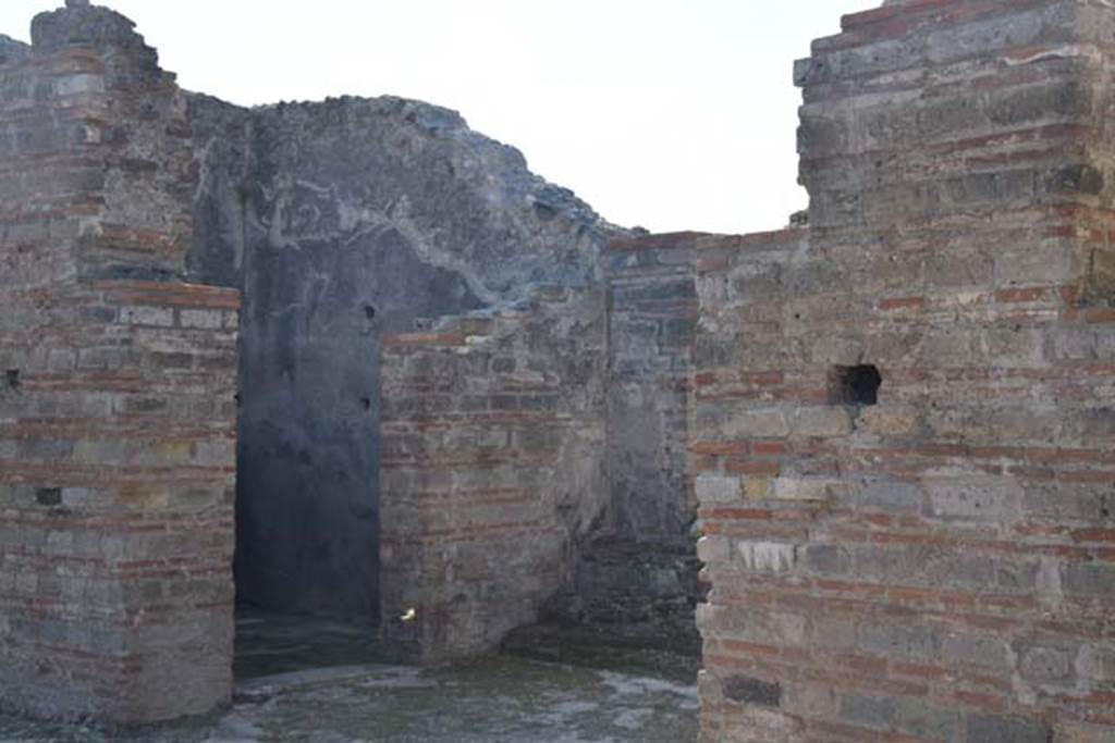 VIII.2.30 Pompeii. November 2016. West side of atrium, with doorway to cubiculum, and opening leading to steps linking to VIII.2.29. Photo courtesy of Marie Schulze.