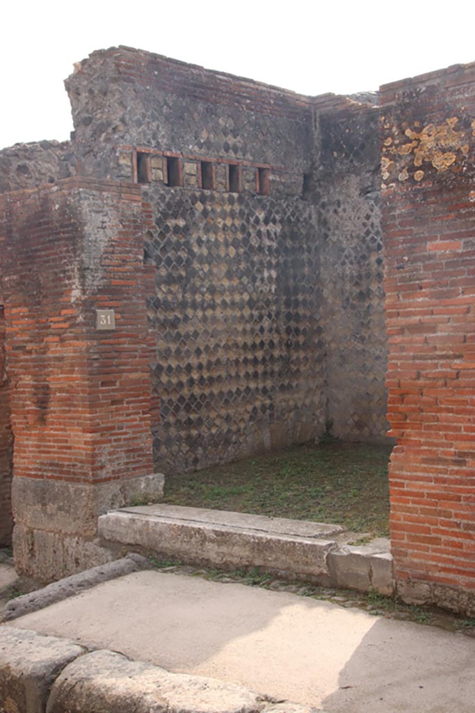 VIII.2.31 Pompeii. October 2023.
Looking south-east towards entrance doorway of shop. Photo courtesy of Klaus Heese.