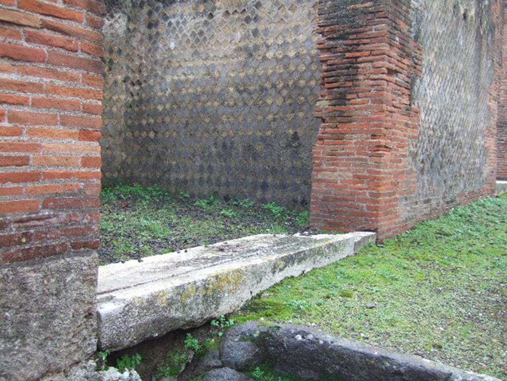 VIII.2.31 Pompeii. December 2006. Threshold or sill of shop, looking west.