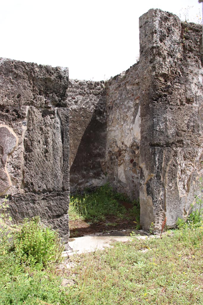VIII.2.34 Pompeii. May 2024.
Doorway to room ‘e’ on east side of atrium. Photo courtesy of Klaus Heese.