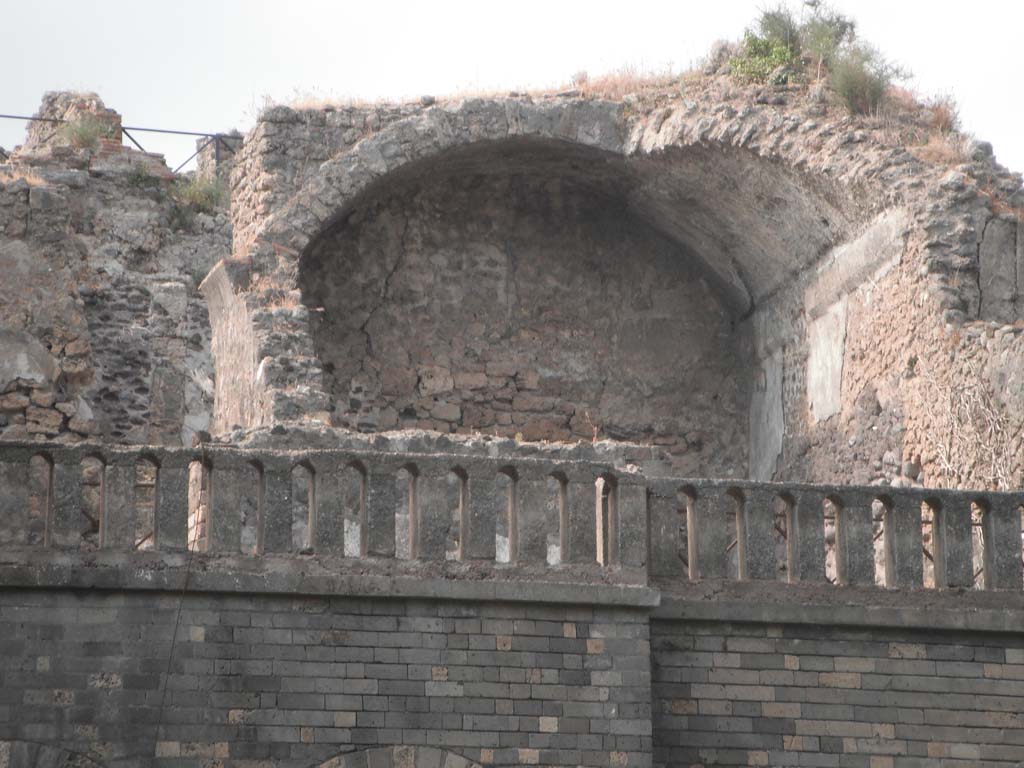 VIII.2.34 Pompeii. May 2011.
Room ‘10’, looking north towards vaulted triclinium on lower level with detail of north wall. Photo courtesy of Ivo van der Graaff.
