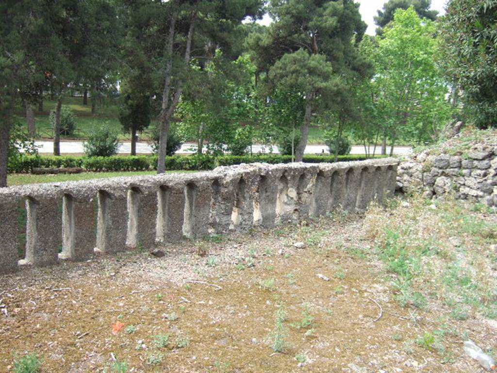 VIII.2.34 Pompeii. May 2006. Looking south-west across terrace ‘12’. Acording to Jashemski, Sogliano said the terrace on the lower level was probably enclosed by a low masonry wall. This wall would have contained a space for plants (a view not accepted by Mau), but only the part on the east was preserved. It was covered with plaster and decorated with a Nile scene which was badly damaged. A crocodile pursued by a pigmy armed with a shield and lance, and also a pigmy woman with a basket, near to which stood a hippopotamus, could be seen. See Sogliano, N.Sc., 1885, p.257
See Jashemski, W. F., 1993. The Gardens of Pompeii, Volume II: Appendices. New York: Caratzas. (p. 209)