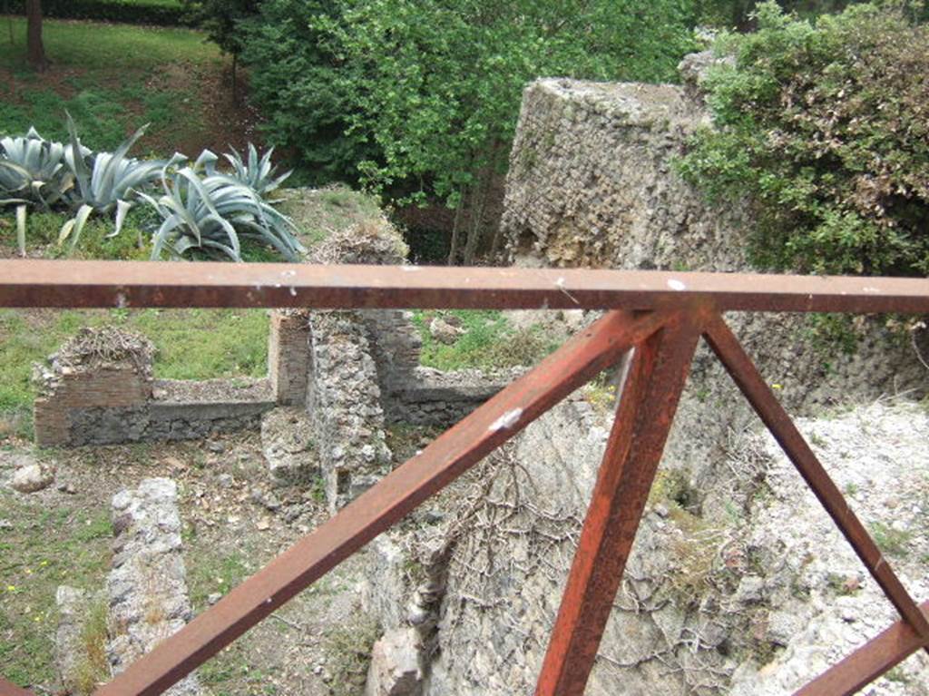 VIII.2.39 Pompeii. May 2006. Looking south overlooking rooms on first lower floor and terrace. Originally, these rooms would have been under the street-level portico and terrace. According to Jashemski, the principal room had a door and two windows that opened onto a wide terrace at the rear on this lower level. A triclinium (room on the lower right) and a cubiculum (on the extreme left of the terrace, see below) each had a window opening onto the terrace.
See Jashemski, W. F., 1993. The Gardens of Pompeii, Volume II: Appendices. New York: Caratzas. (p.209)