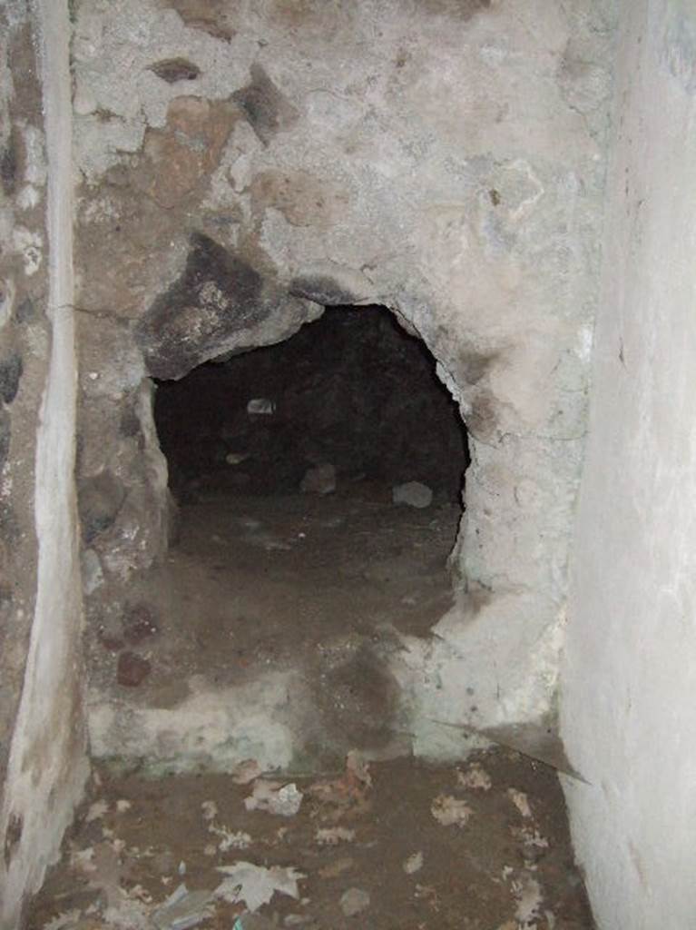 VIII.2.39 Pompeii. May 2006. Hole in west wall at end of corridor b’.