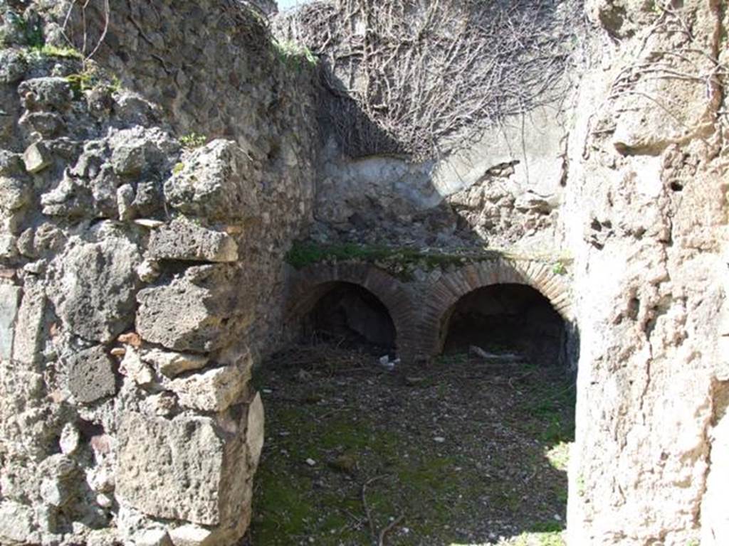 VIII.3.4 Pompeii. March 2009. Doorway to Room 11. Part of Services area, Kitchen?.